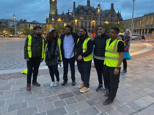 Bradford4Better Team with Nish Kumar at the end of the Don't Mess With Bradford Big Bradford Clean Up event on the 4th of October 2023